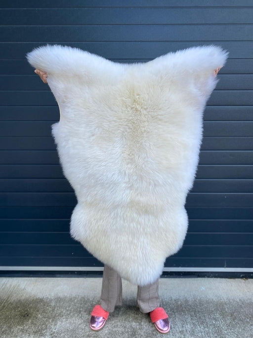 light rare bread British sheepskin rug