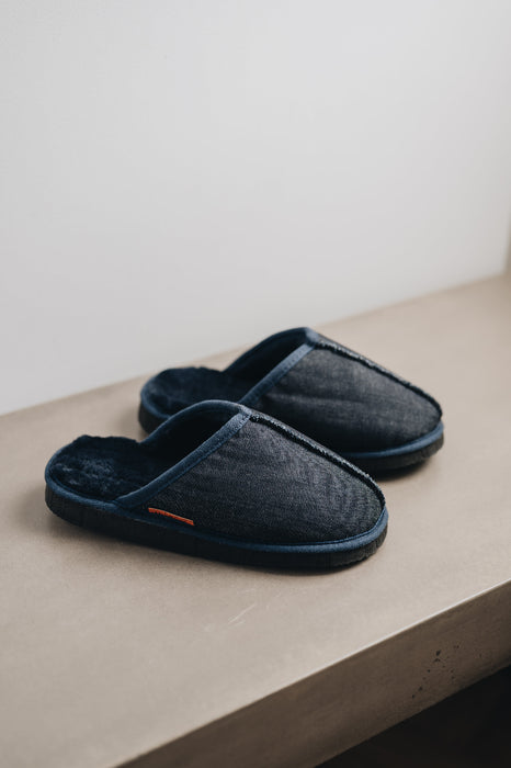 Navy merino sheepskin men's mule slippers with a denim exterior.