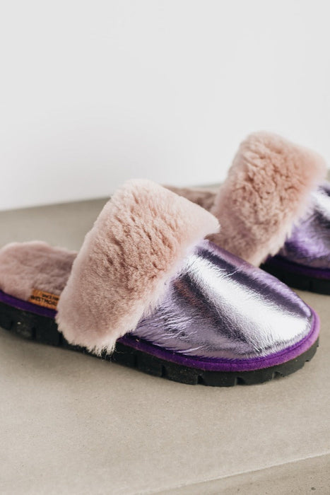 Women slippers in shiny purple
