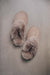 Birds Eye View of Gwen Stone Sheepskin Slippers on Concrete Surface