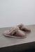 Side View of Gwen Sheepskin Slippers in Walnut on Concrete Surface