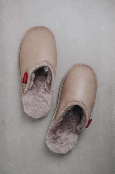 Birds Eye View of Idris Walnut Sheepskin Slippers on Concrete Surface