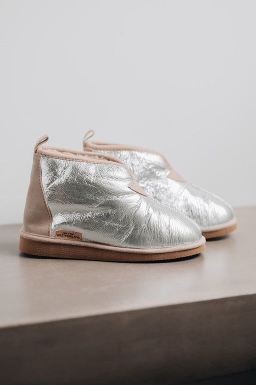 Erin Sheepskin Slipper in Titanium. Ladies Premium double faced sheepskin upper and durable and flexible rubber sole for both indoor and outdoor use. 