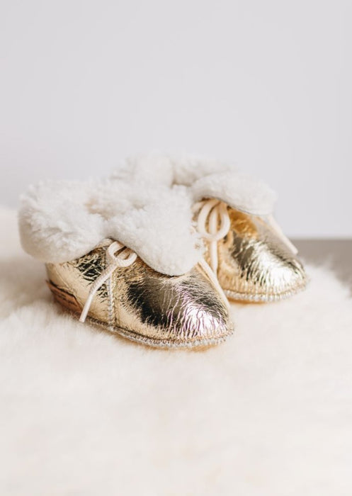 Westmorland Sheepskins Soft Soled Orange foil Baby Sheepskin Boots with a dyed Orange Sheepskin Cuff and laces.