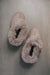 Birds Eye View of Ruby Stone Sheepskin Slippers on Concrete Surface