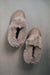 Birds Eye View of Ruby Walnut Sheepskin Slippers on Concrete Surface