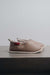 Side View of Sophia Walnut Sheepskin Slippers on Concrete Surface