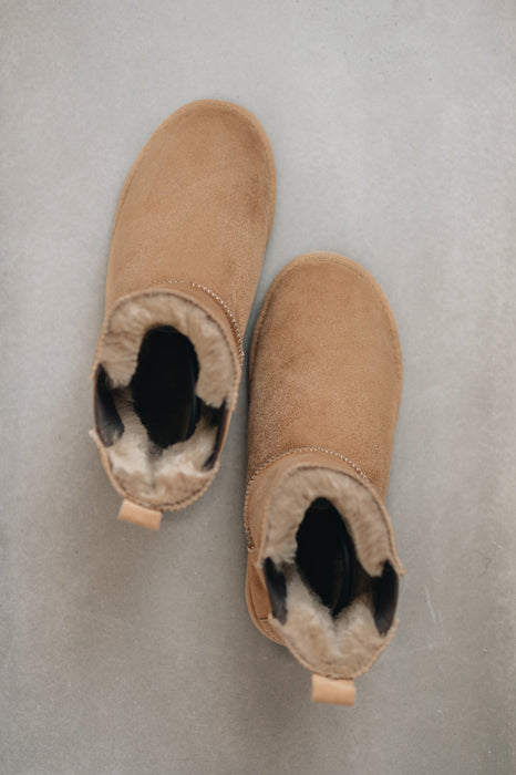 Birds eye view of the Winnie Sheepskin, Chelsea boot style, slipper. A classic sheepskin boot with elastic panels on both sides.