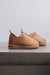 Tan coloured ankle-high men’s sheepskin slipper - Henry profile view