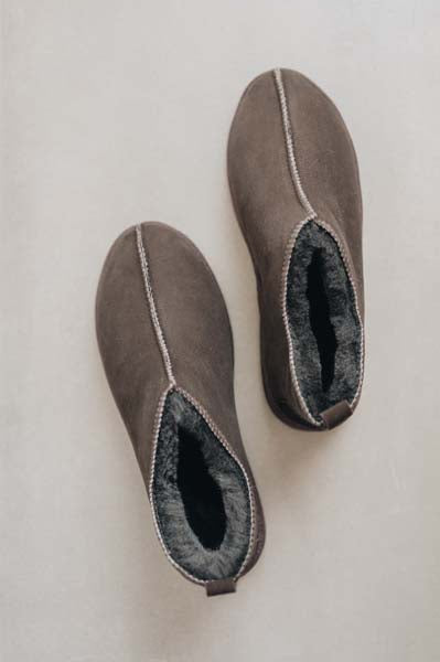 Birds eye view of Hetty ankle-high sheepskin slipper showing plush natural sheepskin wool inside