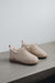 Vanilla coloured ankle-high men’s sheepskin slipper - Hetty profile view