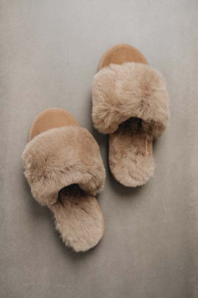 Birds eye view of Veronica Taupe Sheepskin Slippers on Concrete Surface