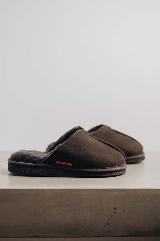 Side view of the brown women's sheepskin mule slipper called Willow.