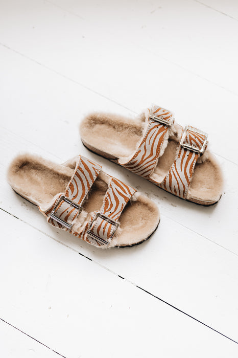 womens sheepskin and cork sandals with 2 buckles and a reflective zebra print