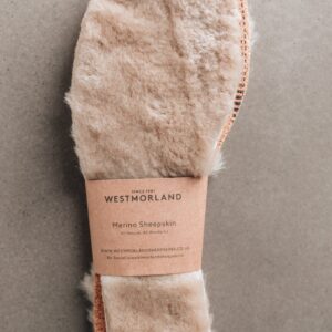 Natural colour Sheepskin Children's Cuttable Insoles. Cut to size. Wrapped in a cardboard informational sleave.