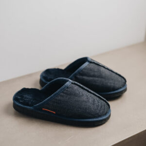 Navy merino sheepskin men's mule slippers with a denim exterior.