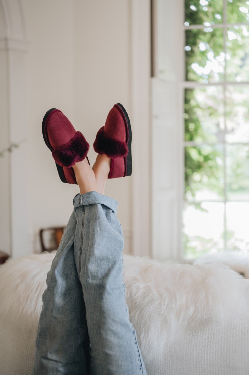Margot cosy women’s sheepskin slippers with a fluffy shearling interior for ultimate warmth.