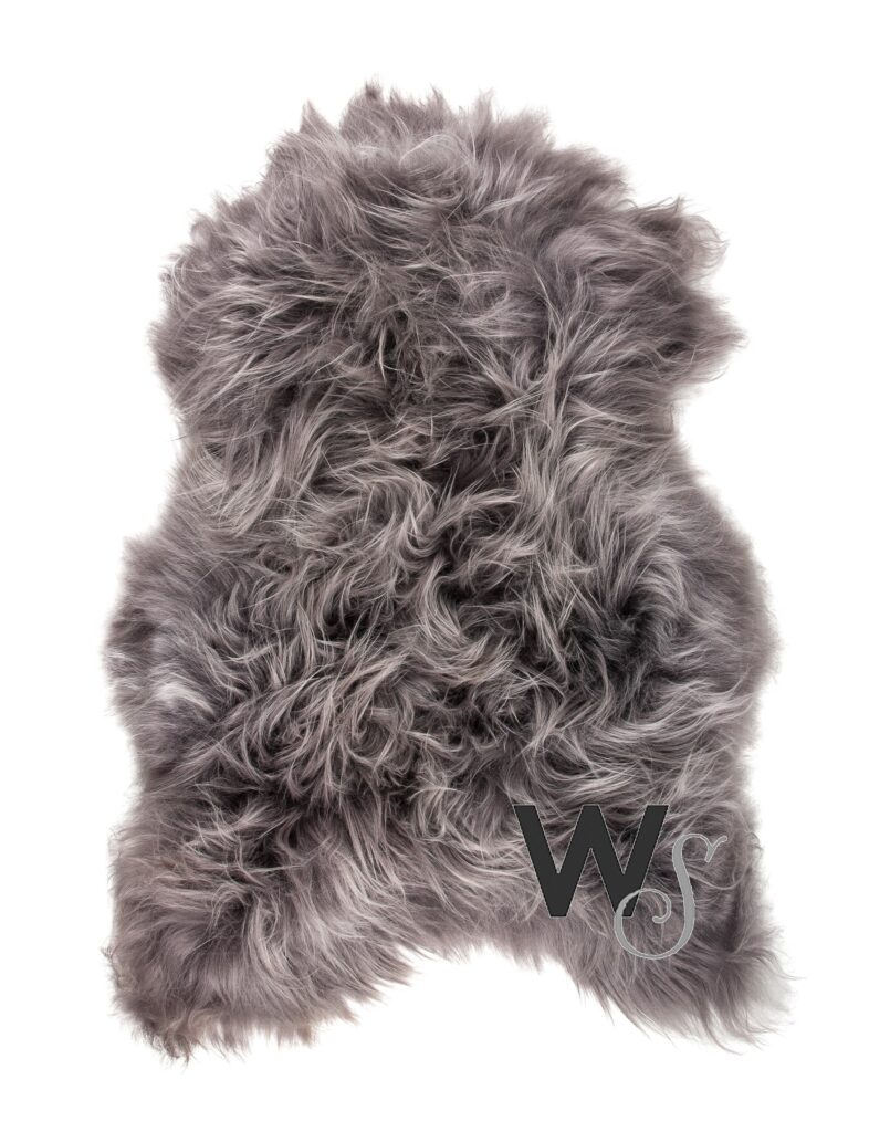 grey sheepskin rug layed on the floor