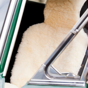 Natural Cream Sheepskin Car Seat Cover, features in a vintage Green car.