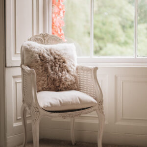 Natural Icelandic sheepskin cushion on chair 
