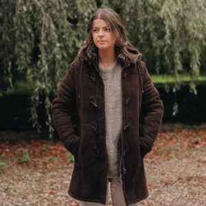 Women wearing brown sheepskin coat